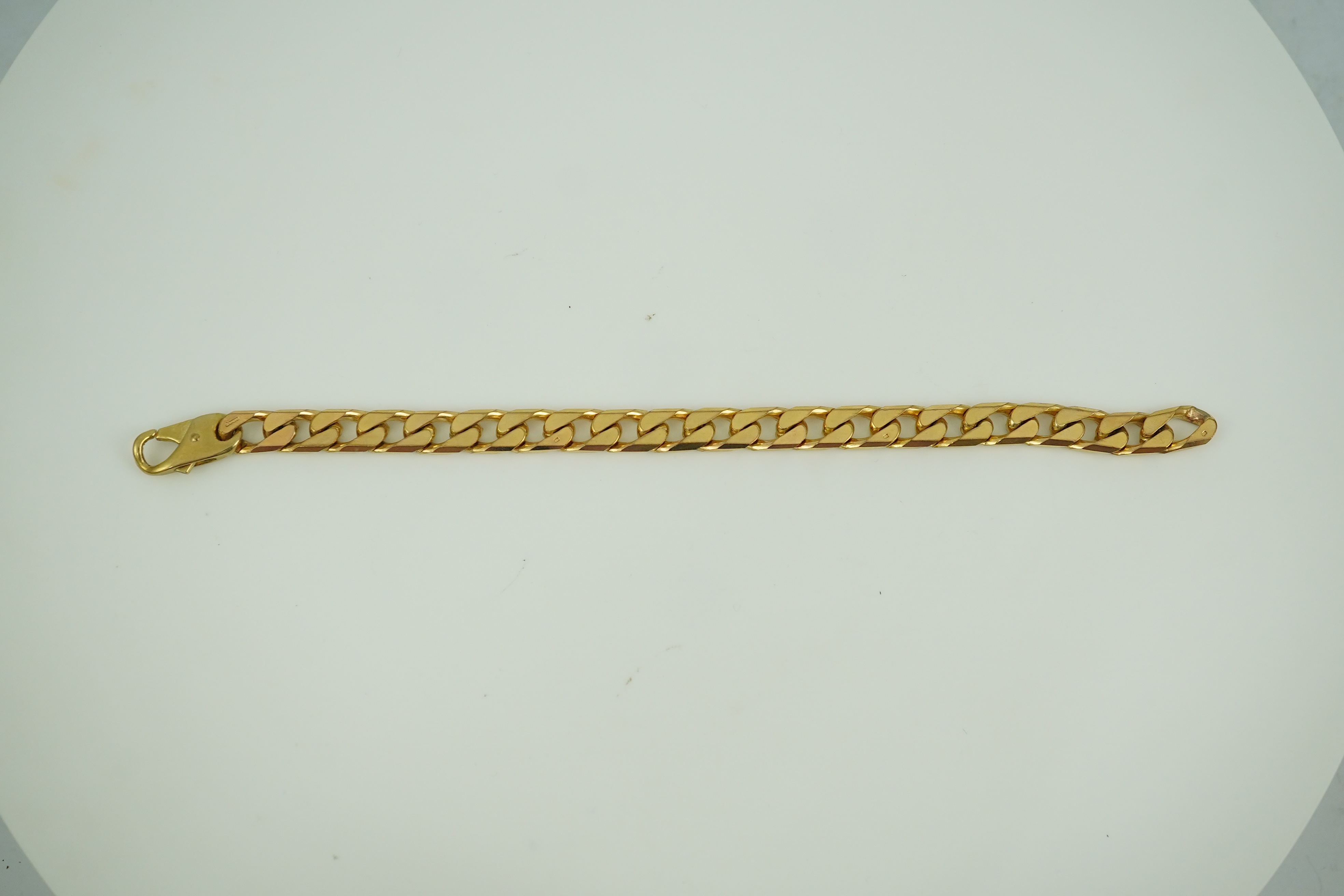 A 9ct gold bracelet, circa 1989